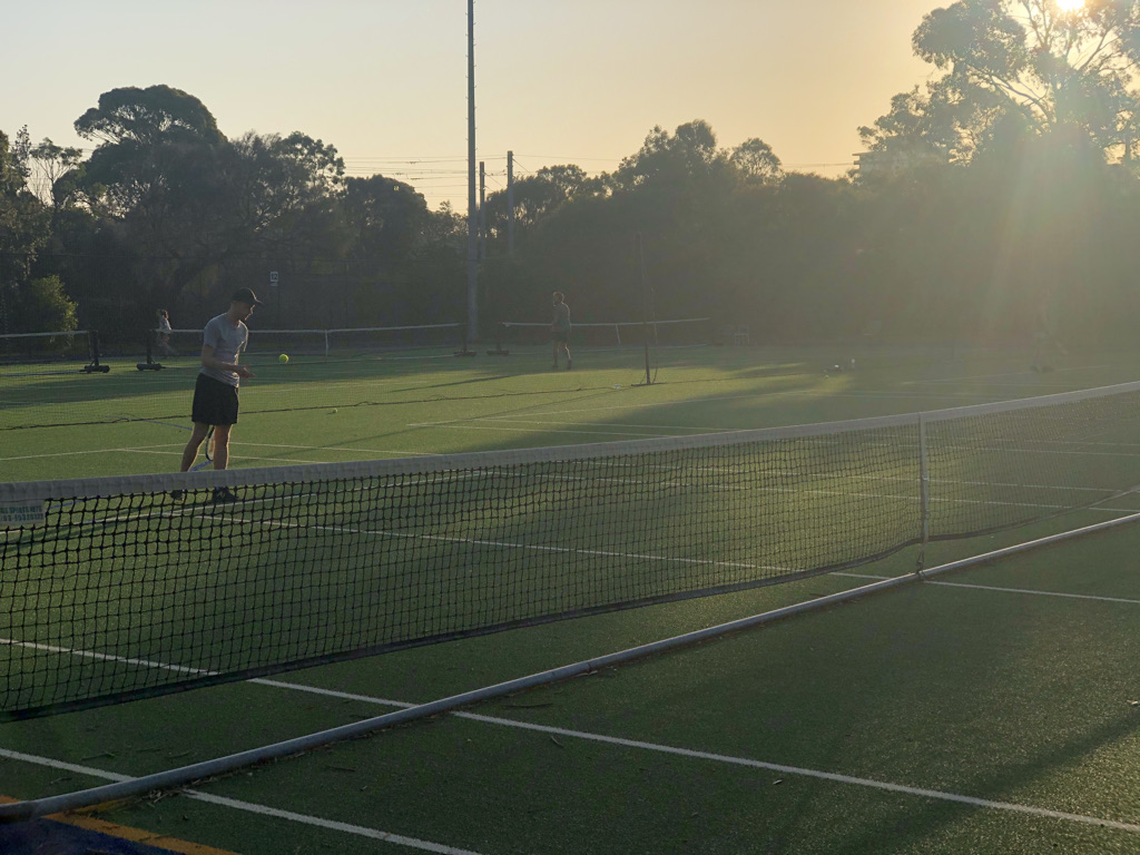 tennis-tourist-melbourne-st-kilda-albert-park-tennis-centre-player-sunset