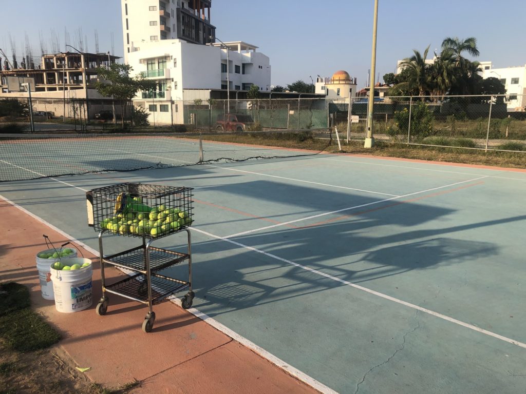 tennis-tourist-mazatlan-mexico-sabalo-country-court-neighborhood